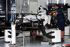 F1 car assembly in the Williams garage, 2015
