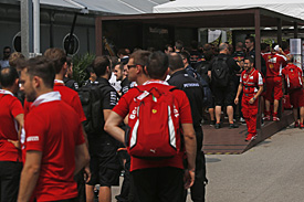 F1 mechanics waiting for curfew, 2015