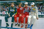 Four drivers go into the last two grands prix with a chance of the title, which Alain Prost wins