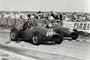 Mike Hawthorn ends Alberto Ascari's nine-race winning streak by beating Juan Manuel Fangio in the French GP