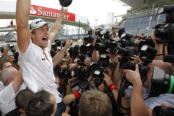 Jenson Button wins the world championship for Brawn GP following Honda's withdrawal