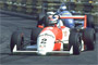 Michael Schumacher (#3) wins the Macau Grand Prix after colliding with Mika Hakkinen (#2)