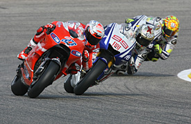 Casey Stoner, Ducati, leads Jorge Lorenzo and Valentino Rossi, Yamaha, Valencia MotoGP 2010