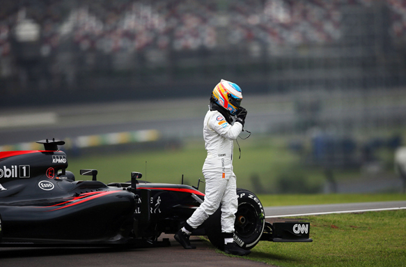 Alonso, broken McLaren